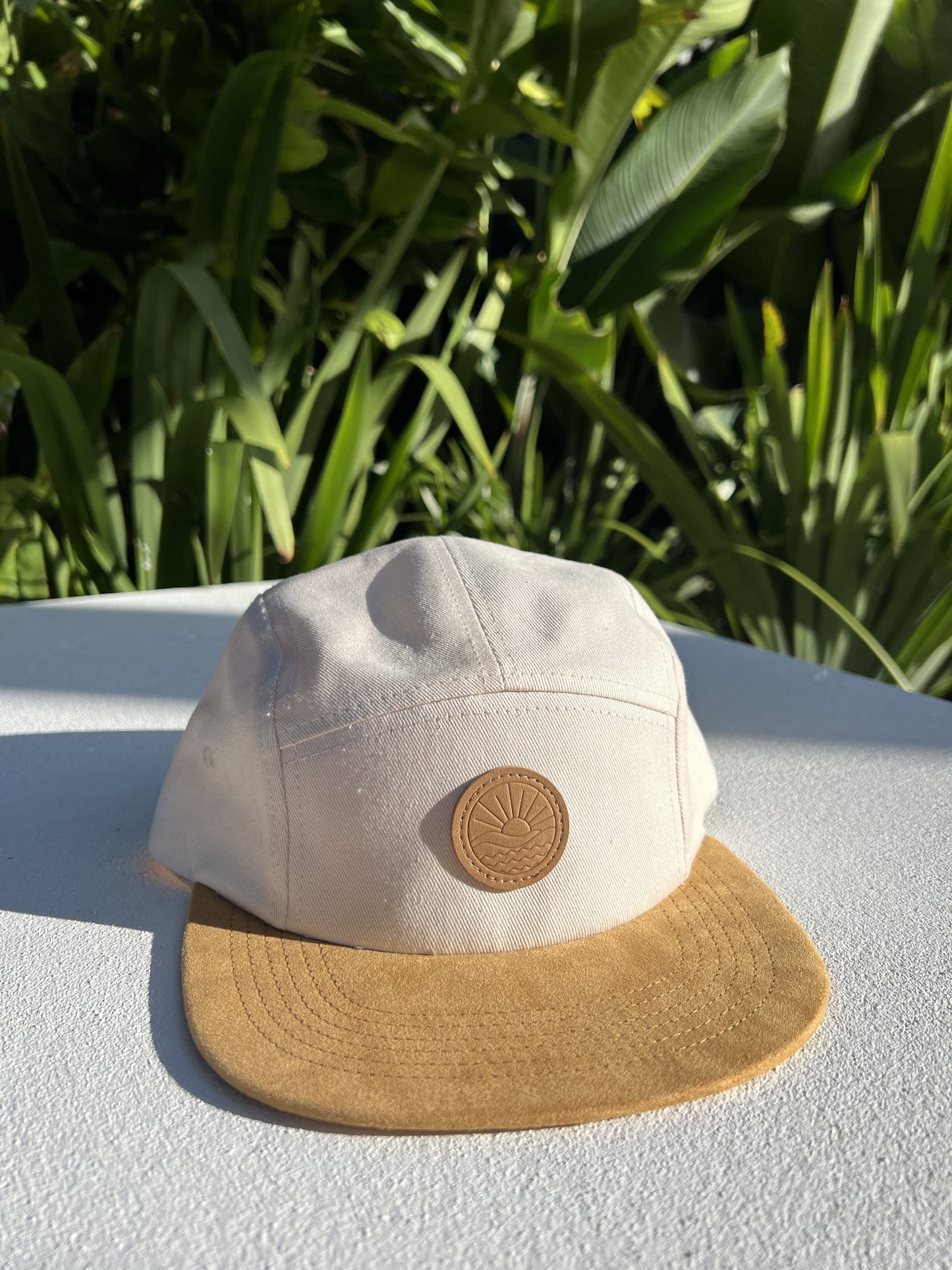 Off white, cotton Children's 5 panel hat, suede brim, leather logo